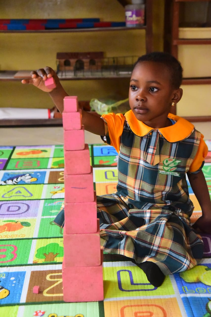Primary Student Building with Blocks